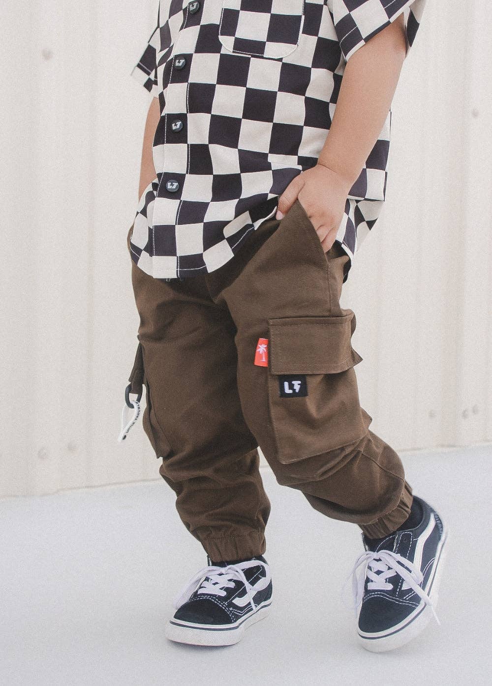Kids checker button-up shirt worn full outfit summer styling view