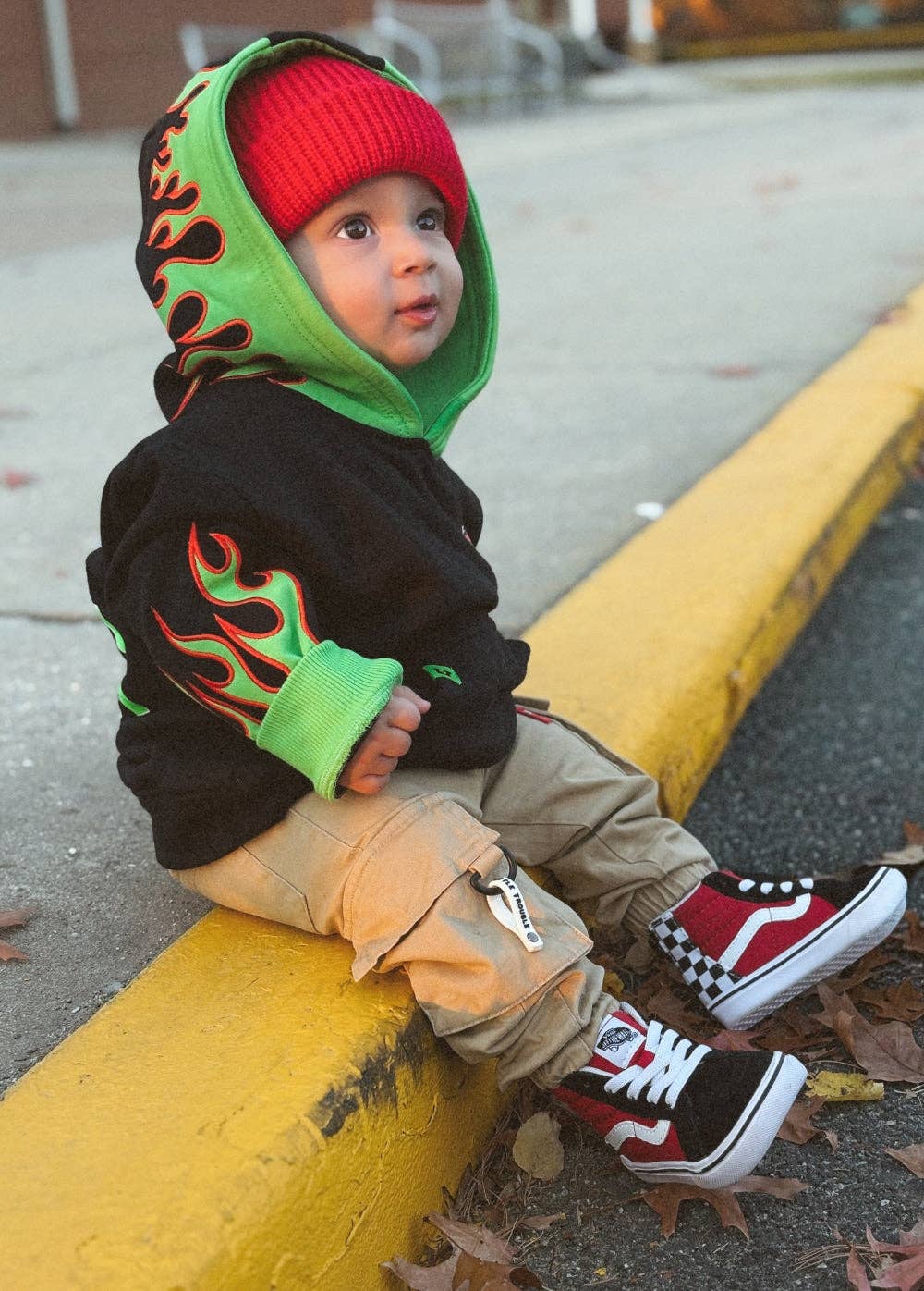 Kids statement hoodie with LT gas tank graphic and green flame sleeves side view