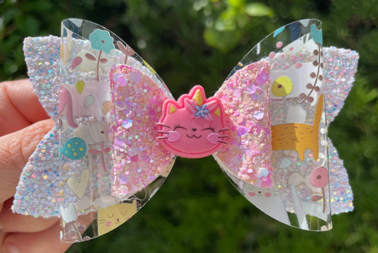 Unicorn kitty cat hair bow for girls glitter vegan leather 4 inch handmade front view